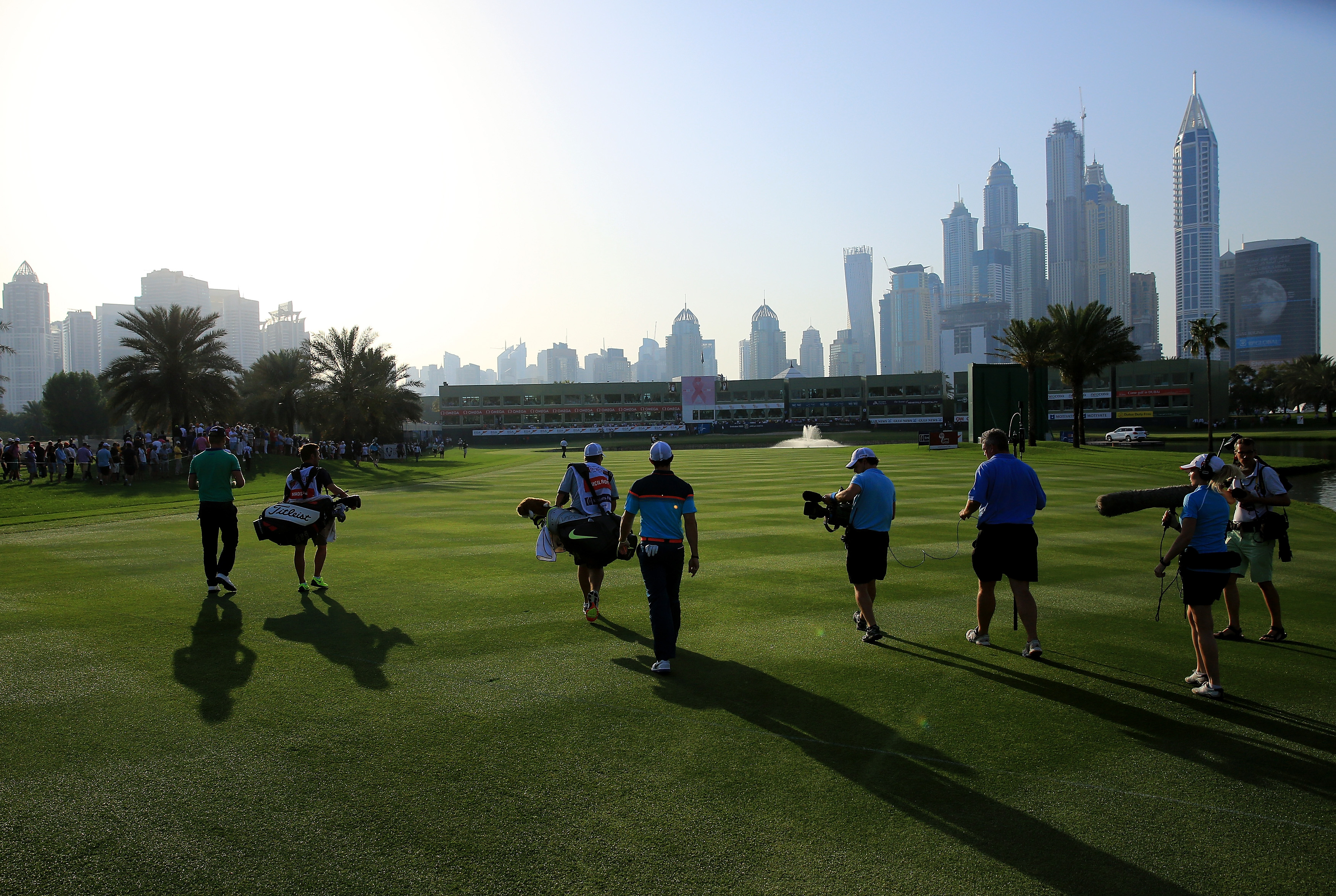 Rory McIlroy walks the 18th hole on his way to victory in last year's Omega Dubai Desert Classic