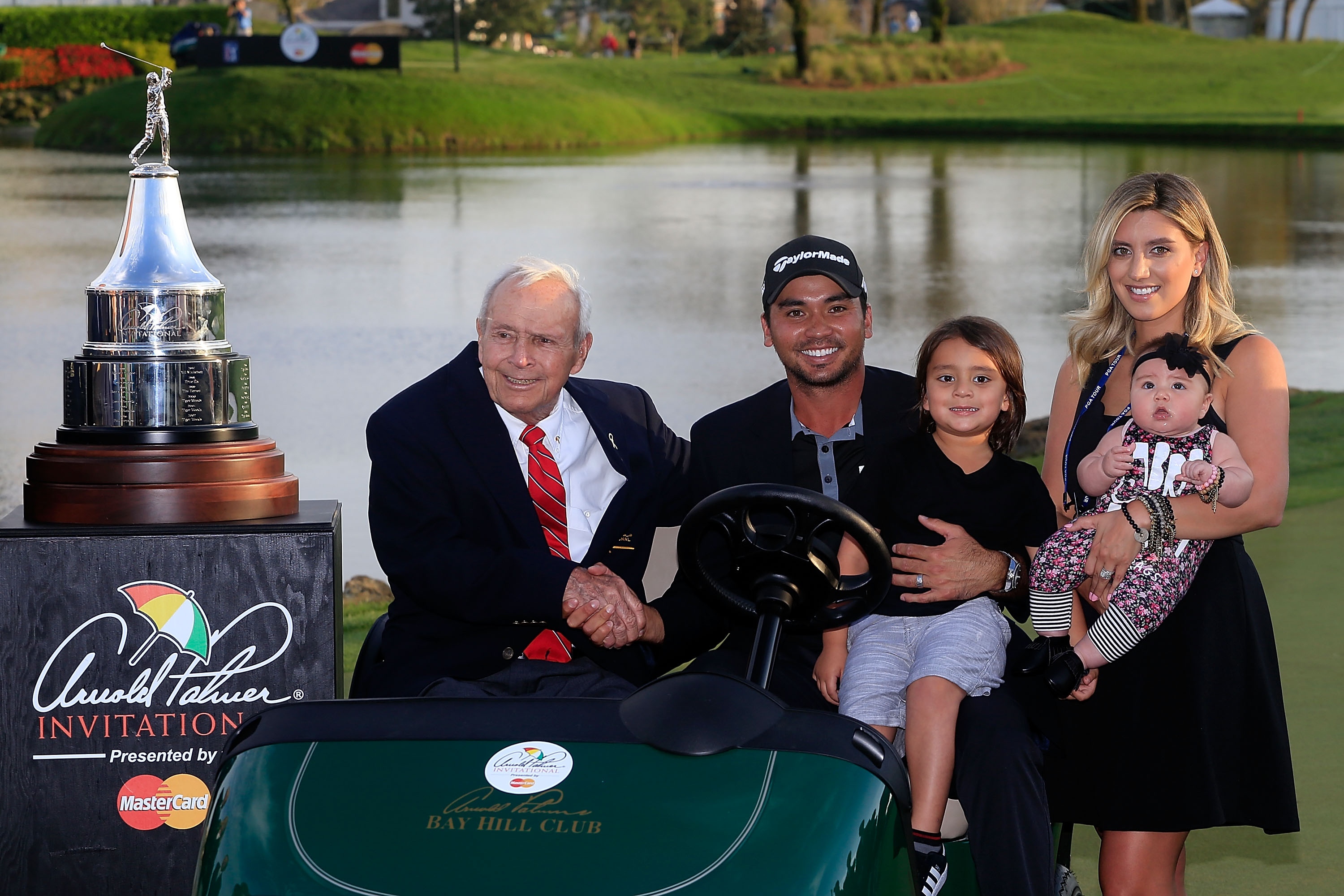 ORLANDO, FL - MARCH 20: Arnold Palmer poses with Jason Day of Australia his wife Ellie and children Dash and Lucy following the final round of the Arnold Palmer Invitational Presented by MasterCard at Bay Hill Club and Lodge on March 20, 2016 in Orlando, Florida. (Photo by Chris Trotman/Getty Images)
