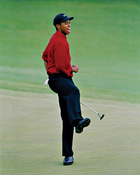 Woods caps the first of his four Masters titles. - Augusta National