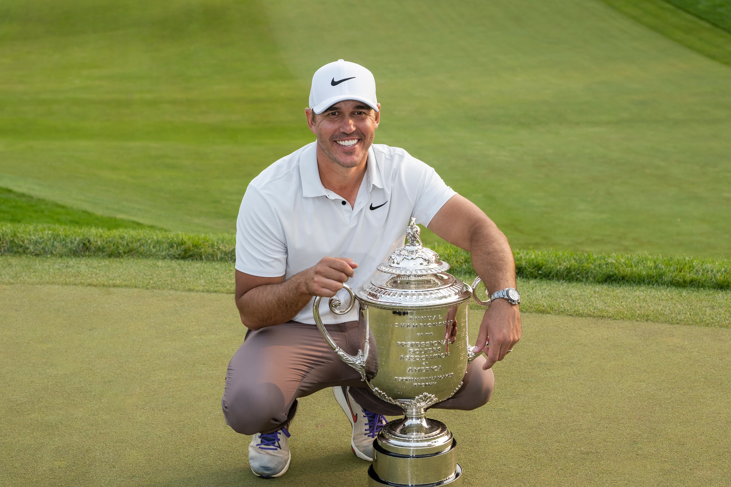 Brooks Koepka (USA) poses with the Wanamaker Trophy after winning the 2023 PGA Championship