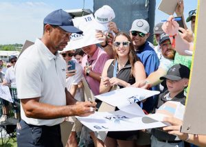 Tiger Woods signs autographs during a practice at Valhalla. Andy Lyons