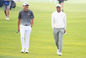 Collin Morikawa and Tiger Woods - Icon Sportswire