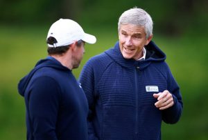 Rory McIlroy talks with PGA Tour commissioner Jay Monahan last week during the RBC Canadian Open - Vaughn Ridley