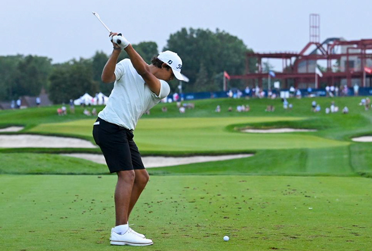 Charlie Woods plays his tee shot on the ninth hole during the second round of stroke play of the 2024 U.S. Junior Amateur - Logan Whitton