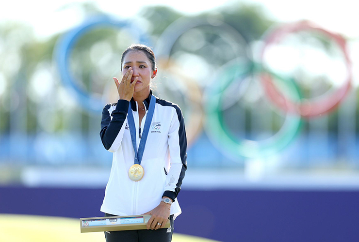 Gold medalist Lydia Ko reacts on the podium - Andrew Redington