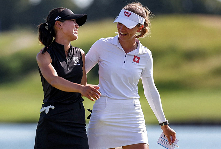 Lydia Ko celebrates winning the gold medal with Switzerland's Morgane Metraux - PIERRE-PHILIPPE MARCOU