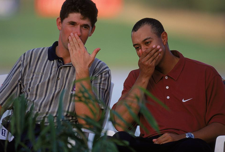 Padraig Harrington shares a joke with Tiger Woods on the final day of the 2001 Dubai Desert Classic at the Emirates GC in Dubai - David Cannon