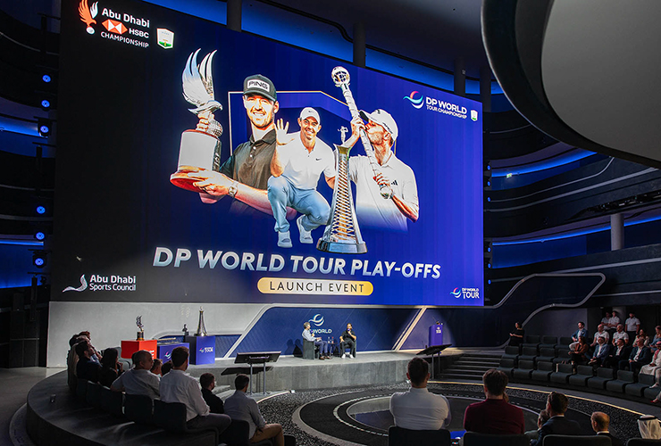 Host Robbie Greenfield interviews Tommy Fleetwood on stage