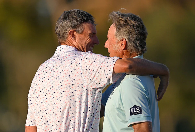 Steven Alker congratulates Bernhard Langer on the 18th green during the final round of the Charles Schwab Cup Championship at Phoenix Country Club. Ben Jared