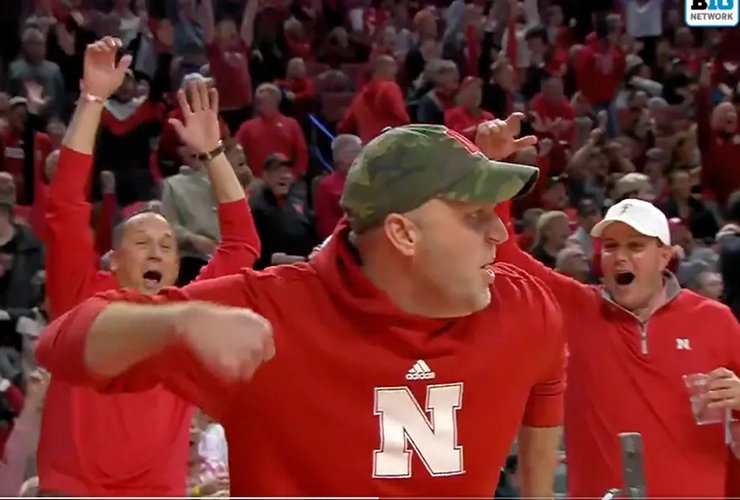 Nebraska fan drains full-court putt to win a PORSCHE, gives Tiger-esque fist pump